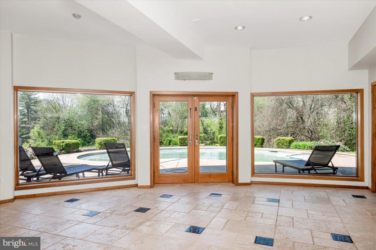 11127 Dublin Road Woodsboro, MD 21798 - Photo 50 of 62 a outdoor space with patio the couch and large windows