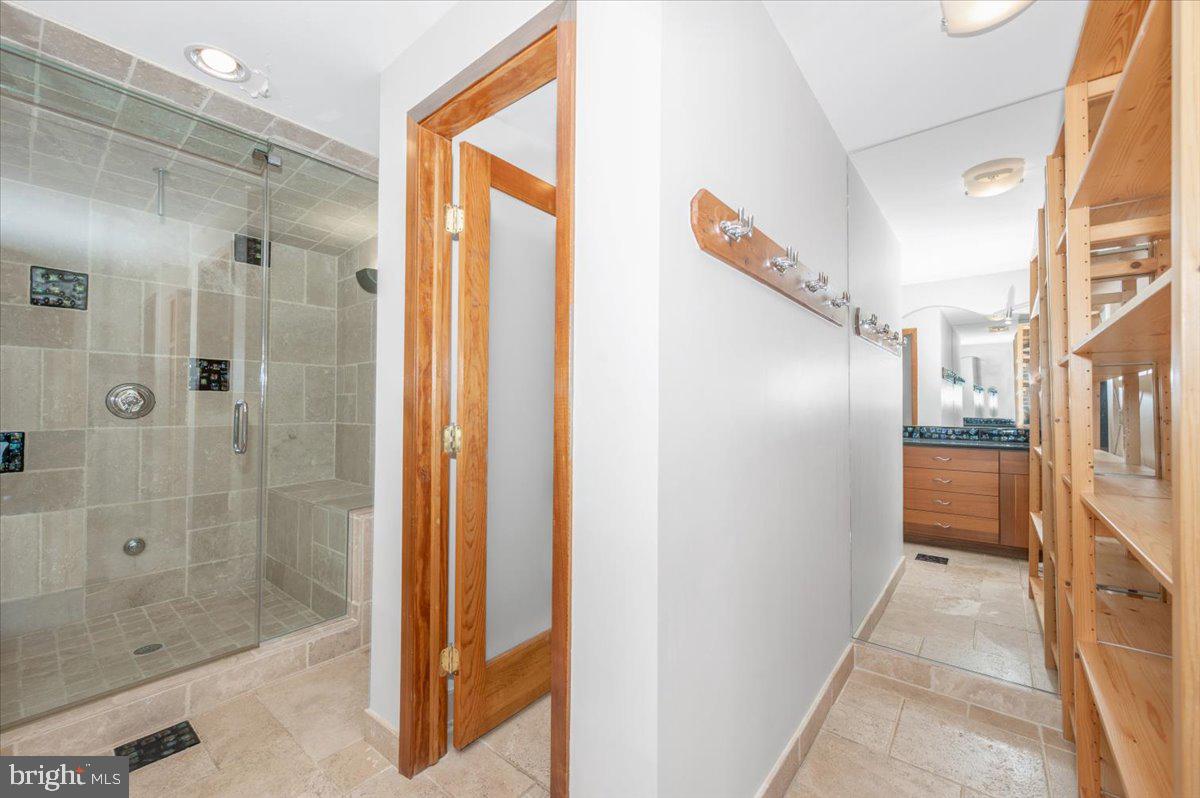 11127 Dublin Road Woodsboro, MD 21798 - Photo 57 of 62 a bathroom with a glass shower door