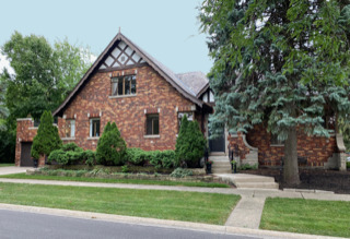 595 East Parkway Road Riverside, IL 60546 - Photo 1 of 35 a front view of a house with a yard