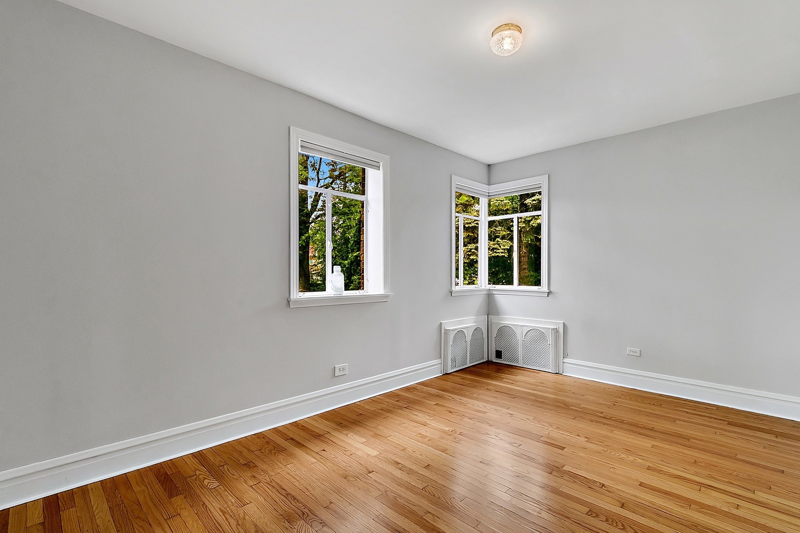 595 East Parkway Road Riverside, IL 60546 - Photo 14 of 35 a view of empty room with wooden floor and fan