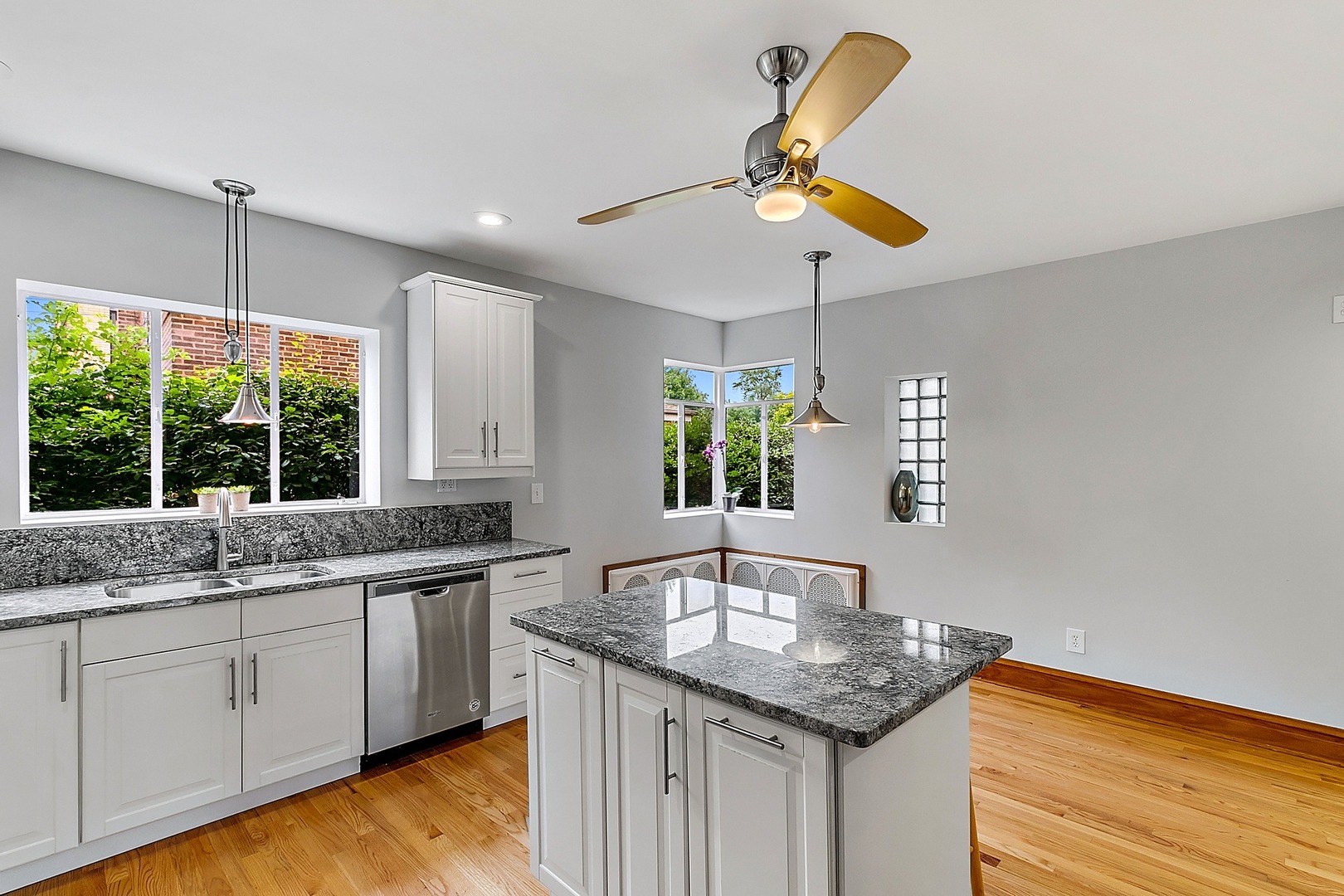 595 East Parkway Road Riverside, IL 60546 - Photo 8 of 35 a kitchen with stainless steel appliances granite countertop a sink a stove and a granite counter tops
