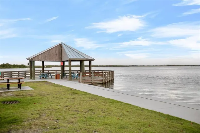 a view of a swimming pool with an ocean view