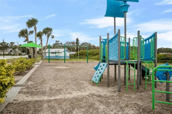 a view of a park with swings