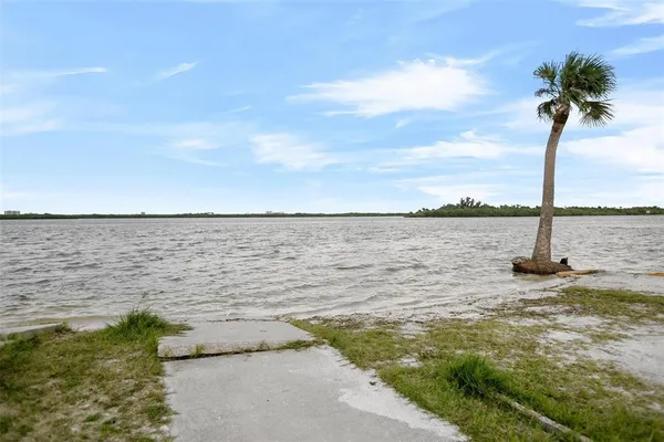 a view of a lake with a beach