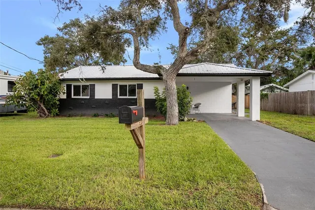 a house view with a garden space