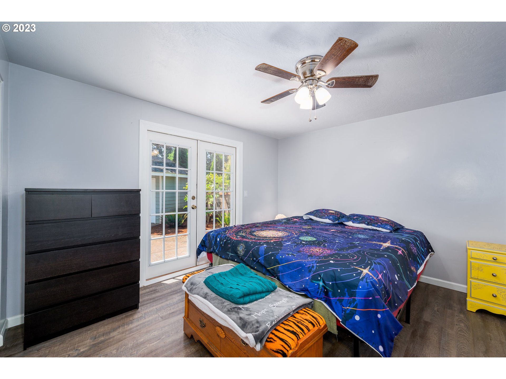 1930 Fabry Road Southeast Salem, OR 97306 - Photo 20 of 33 a bedroom with a bed window and a ceiling fan
