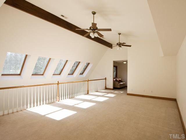8509 Smith Road Apex, NC 27539 - Photo 12 of 25 Who would not love this fabulous bonus room? Light and bright with room for numerous activities, even a pool table! Bonus Room