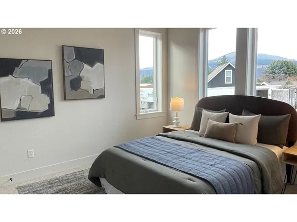 a black and white photo of a house