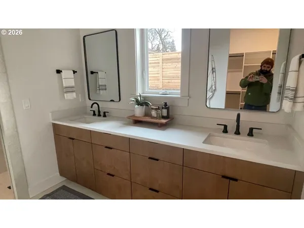 a bedroom with a bed and night stand