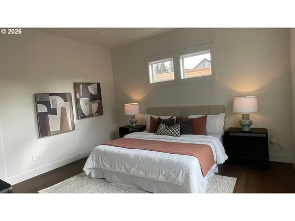a kitchen with a sink refrigerator and cabinets