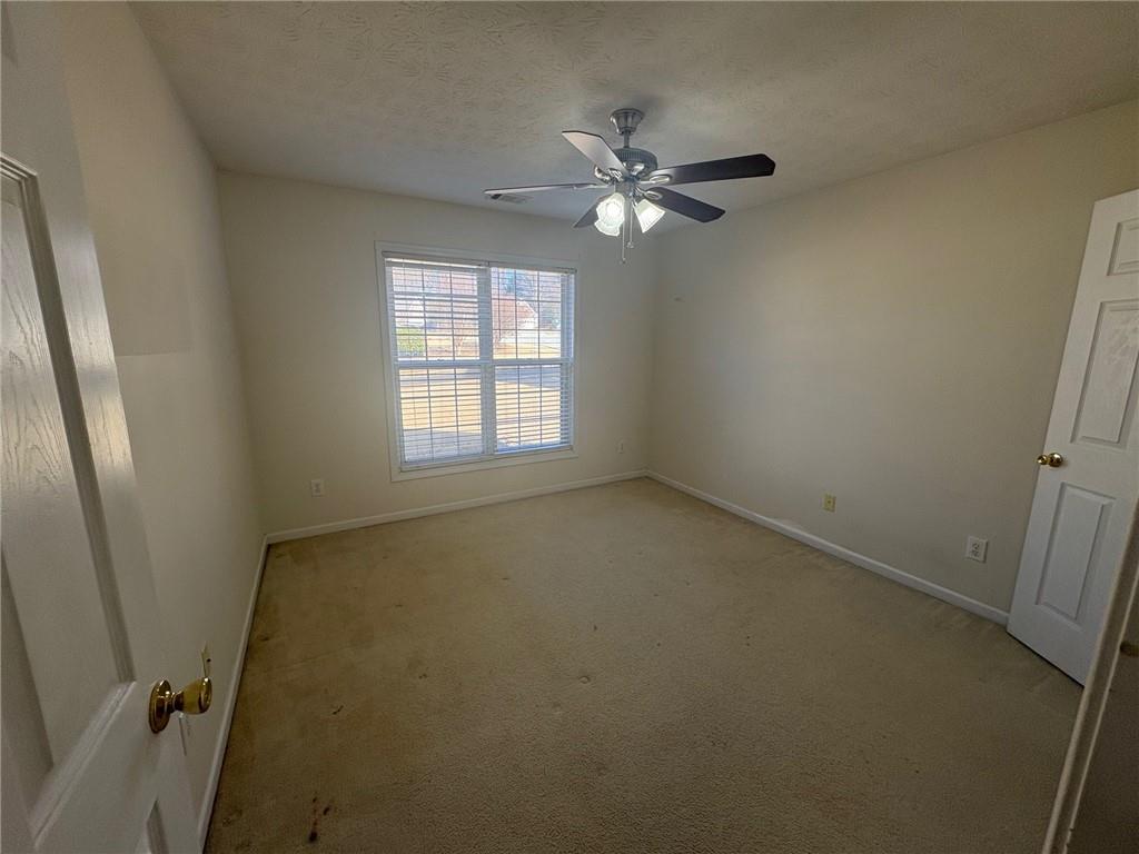 3452 Morning Top Place Suwanee, GA 30024 - Photo 16 of 33 a view of an empty room with a window