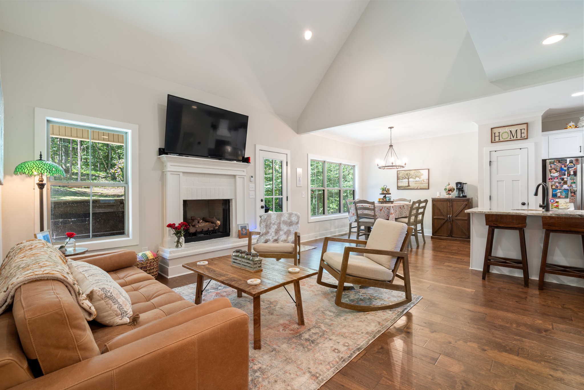 659 Turney Road Auburntown, TN 37016 - Photo 12 of 40 a living room with furniture fireplace and a flat screen tv