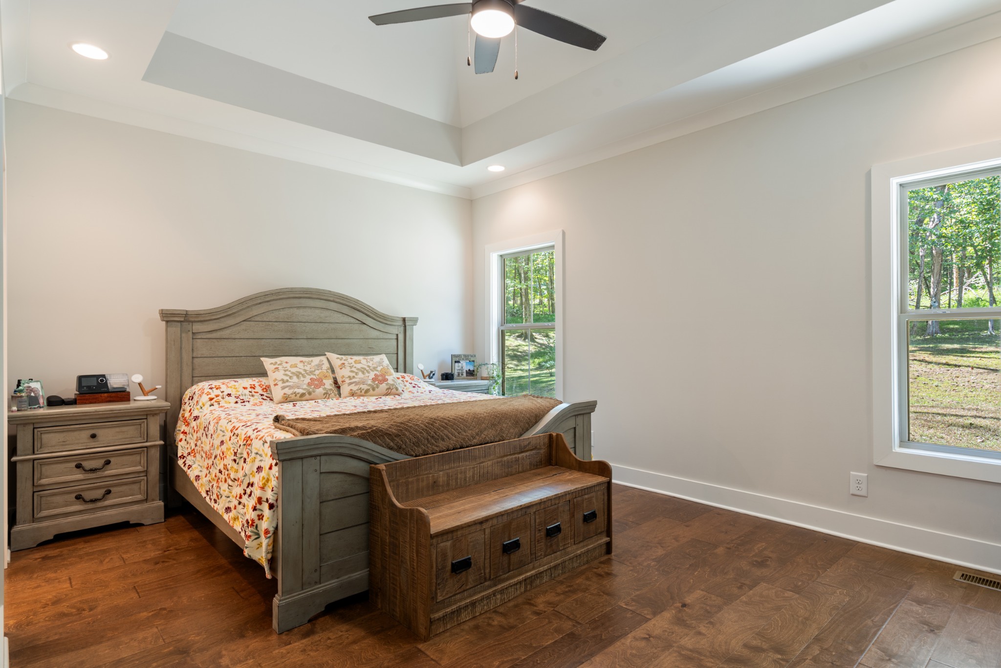 659 Turney Road Auburntown, TN 37016 - Photo 23 of 40 a bedroom with a bed and a chandelier