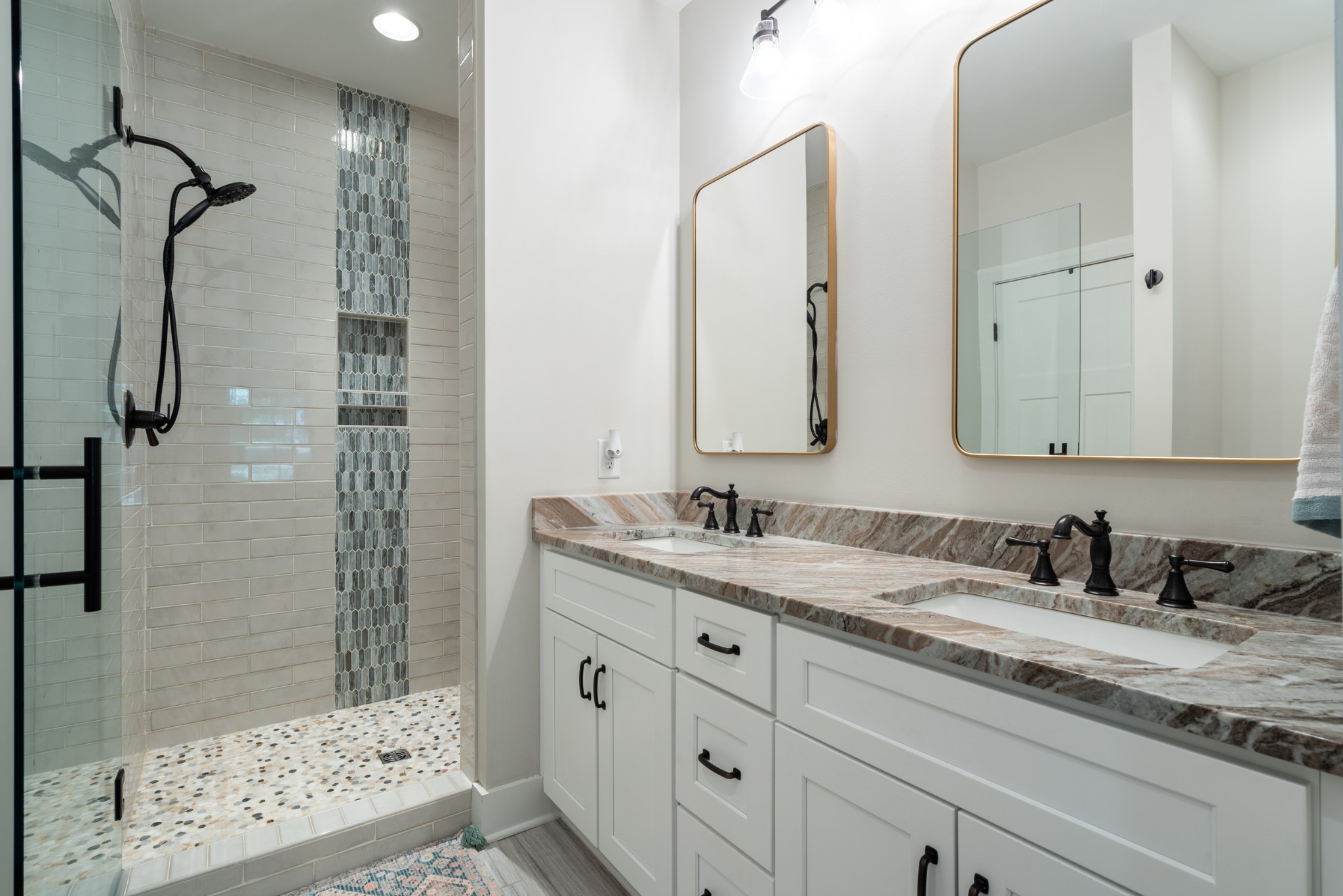 659 Turney Road Auburntown, TN 37016 - Photo 25 of 40 a bathroom with a double vanity sink mirror and shower