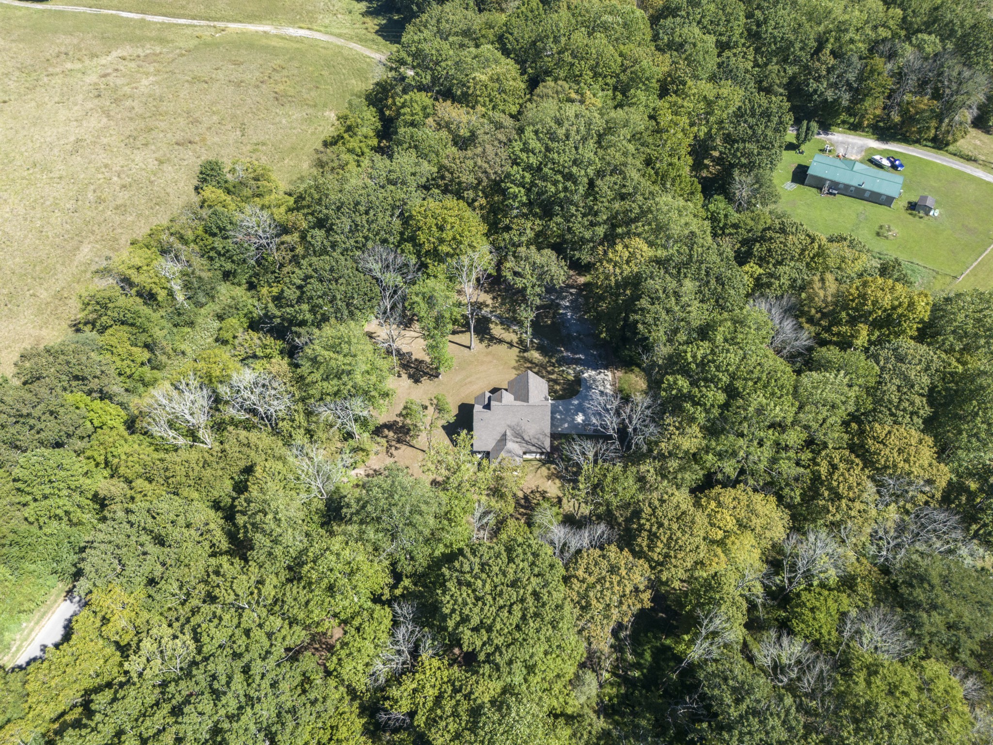 659 Turney Road Auburntown, TN 37016 - Photo 36 of 40 a view of a houses with a yard