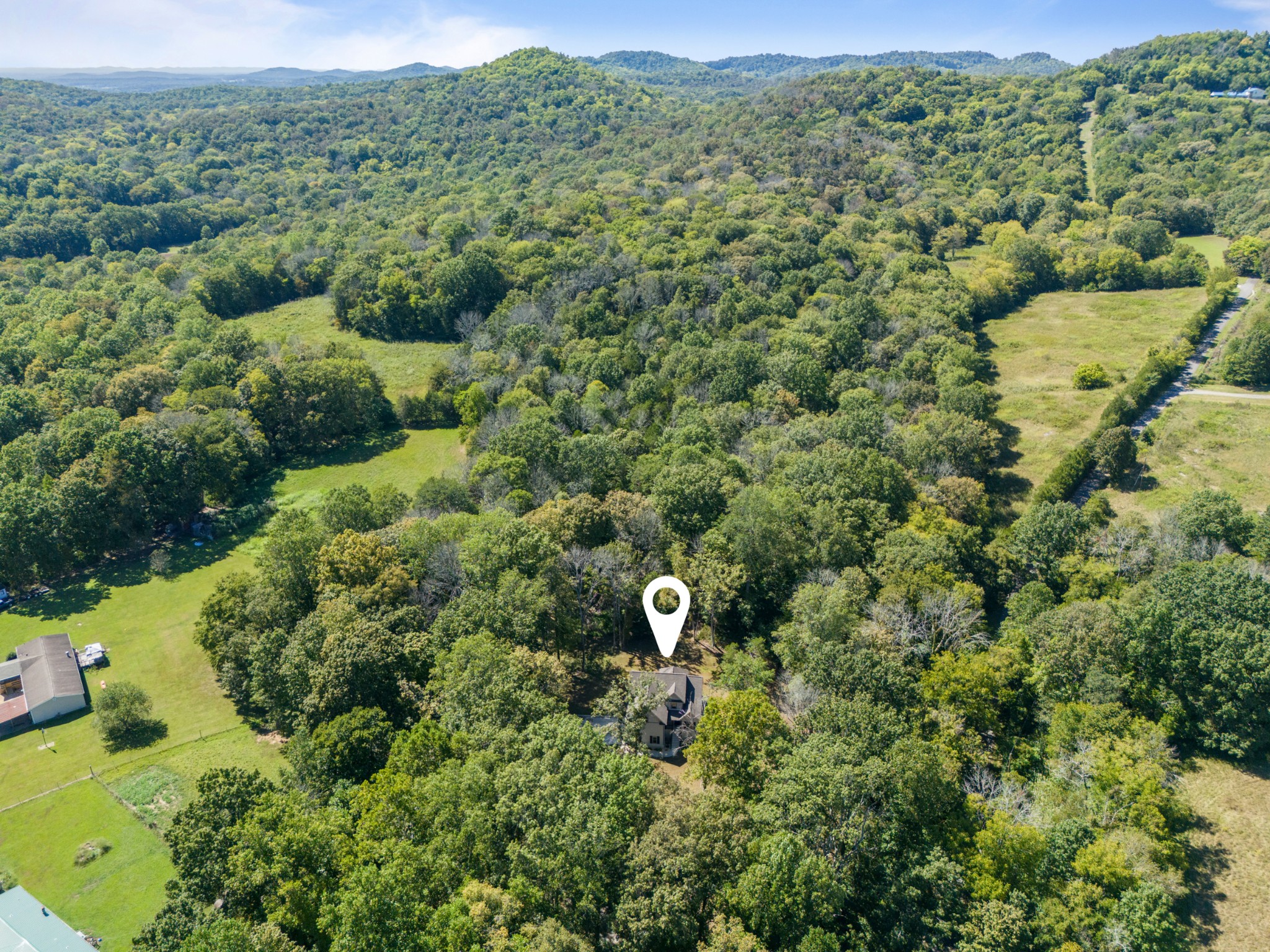 659 Turney Road Auburntown, TN 37016 - Photo 39 of 40 view of a forest with a street