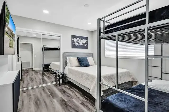 a bedroom with a bed and a walk in closet