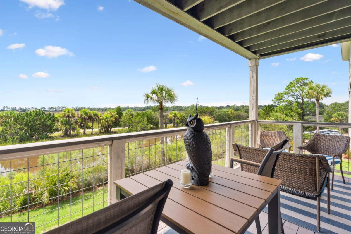 16 Hidden Harbor Road Brunswick, GA 31525 - Photo 12 of 42 a view of a chairs and table in patio