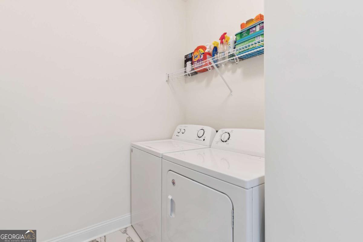 16 Hidden Harbor Road Brunswick, GA 31525 - Photo 32 of 42 a utility room with dryer and washer
