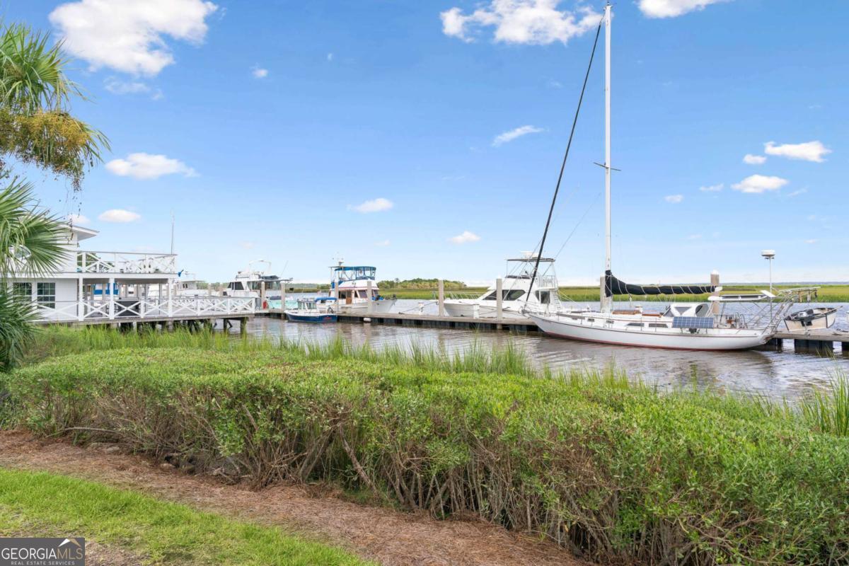 16 Hidden Harbor Road Brunswick, GA 31525 - Photo 35 of 42 a view of a lake with boats and trees