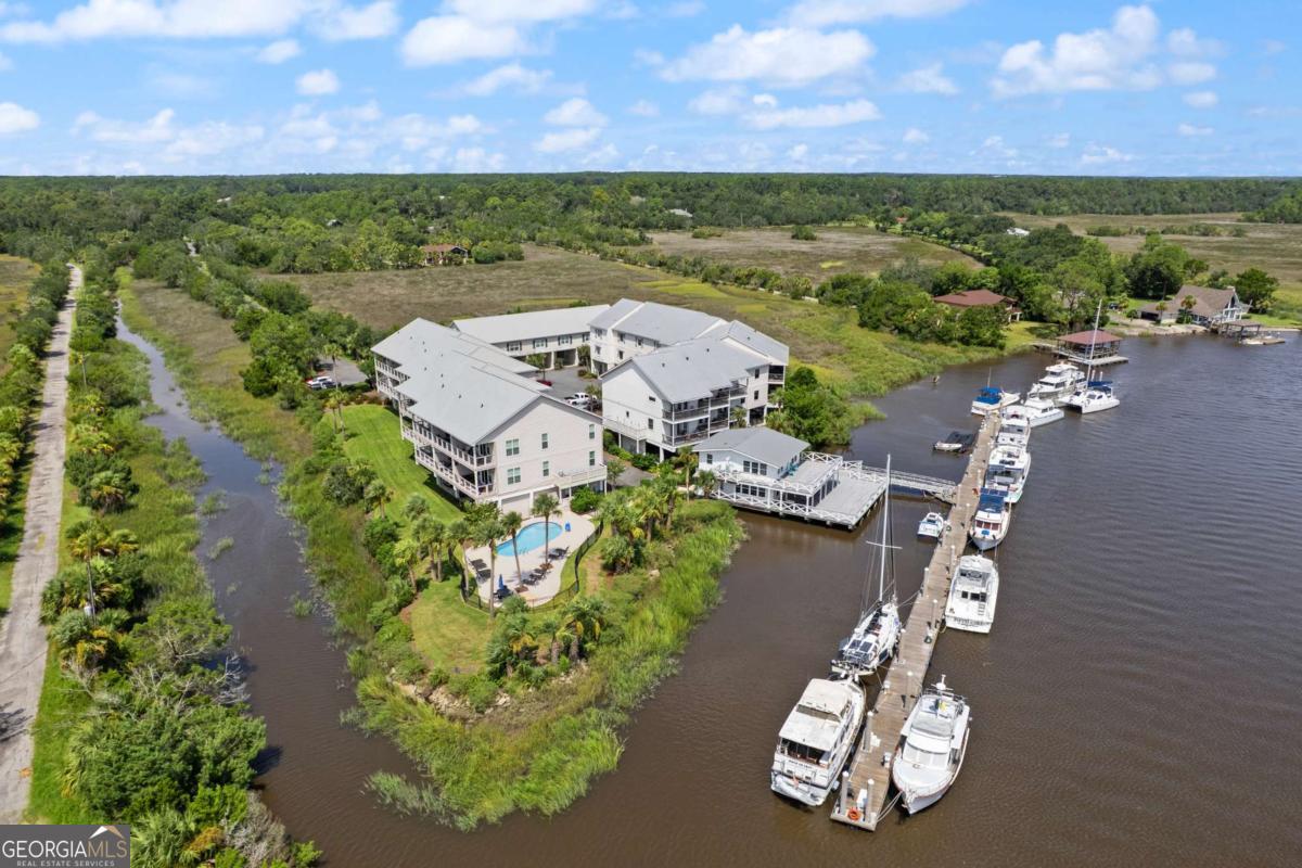 16 Hidden Harbor Road Brunswick, GA 31525 - Photo 38 of 42 an aerial view of a house with a lake view