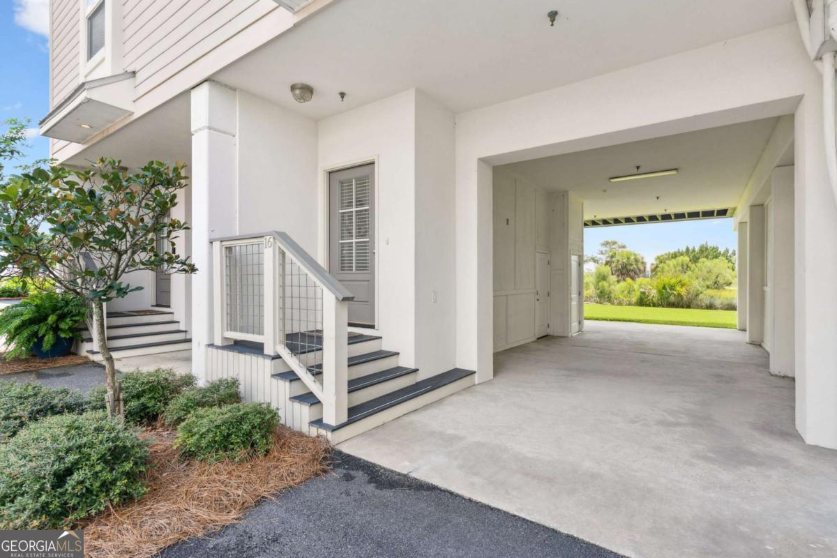 16 Hidden Harbor Road Brunswick, GA 31525 - Photo 6 of 42 a view of entryway with garden