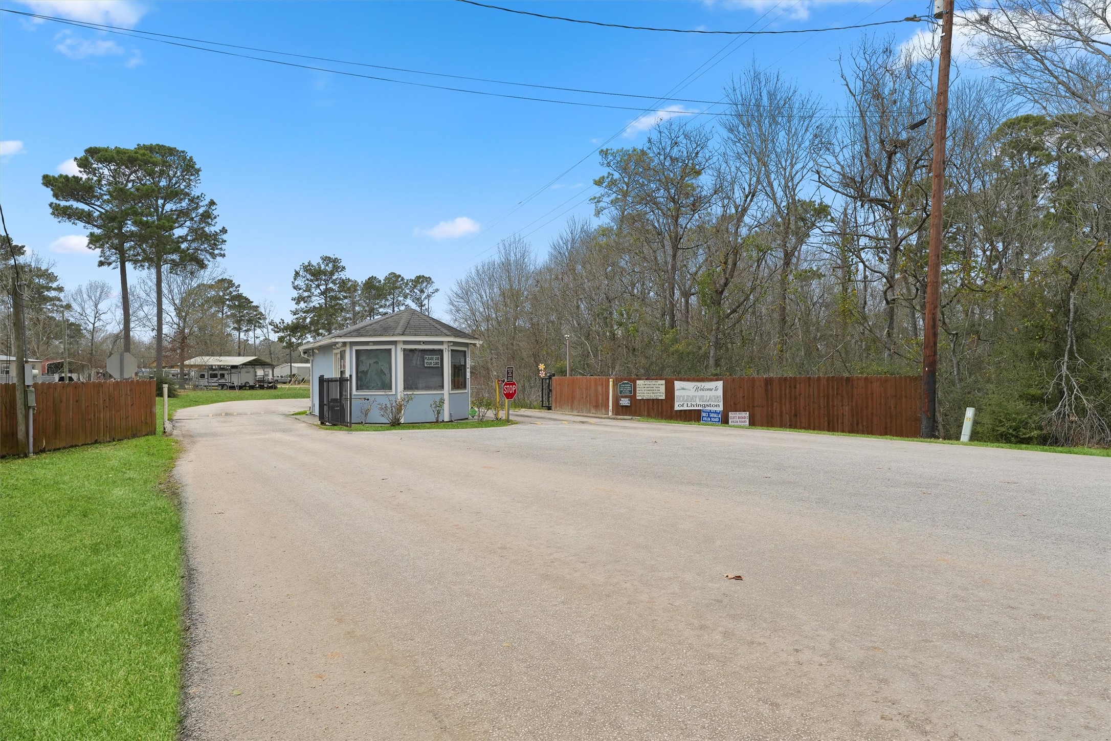 231 Monte Carlo Road Point Blank, TX 77364 - Photo 15 of 15 a view of a house with a yard