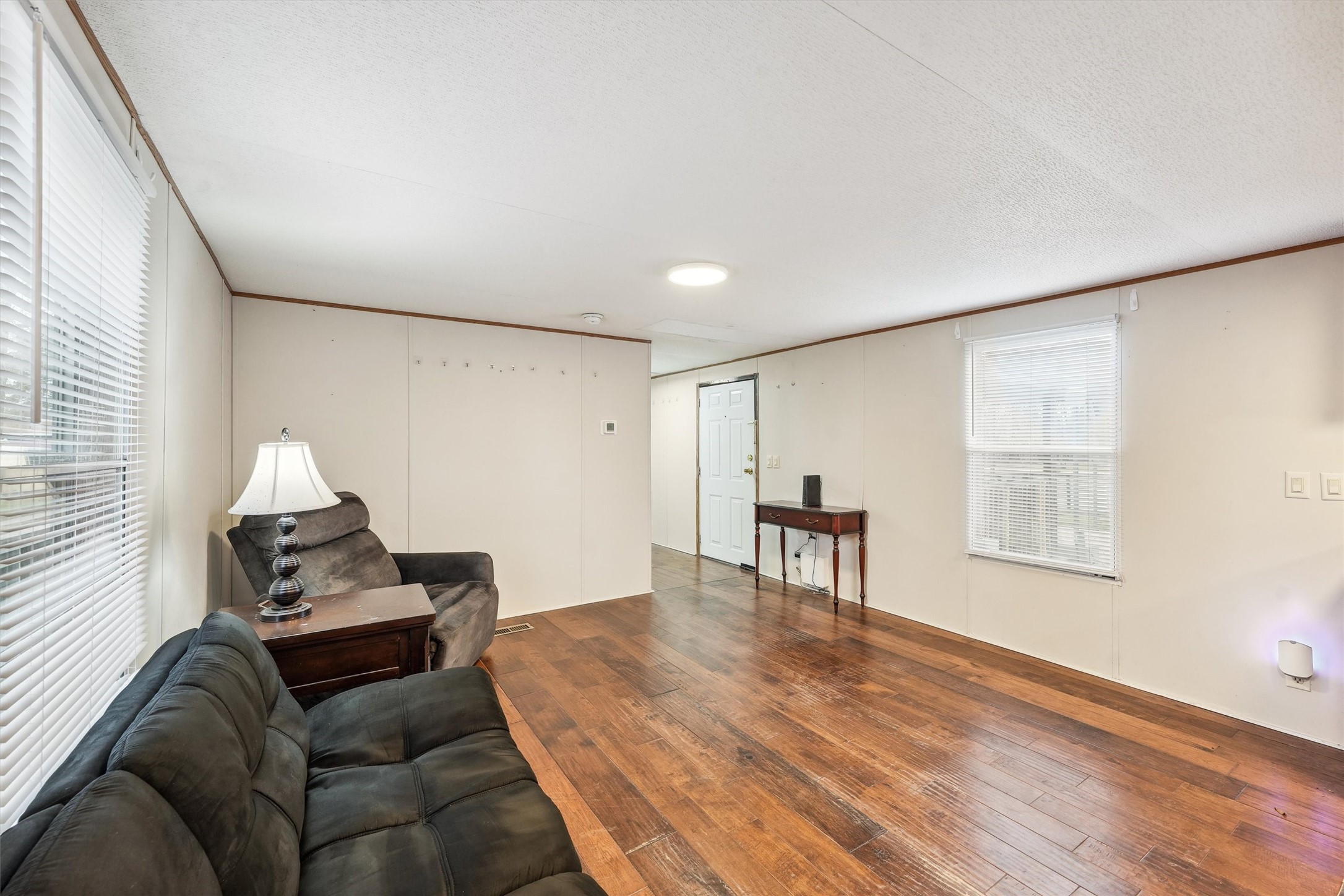 231 Monte Carlo Road Point Blank, TX 77364 - Photo 4 of 15 a living room with furniture and a window