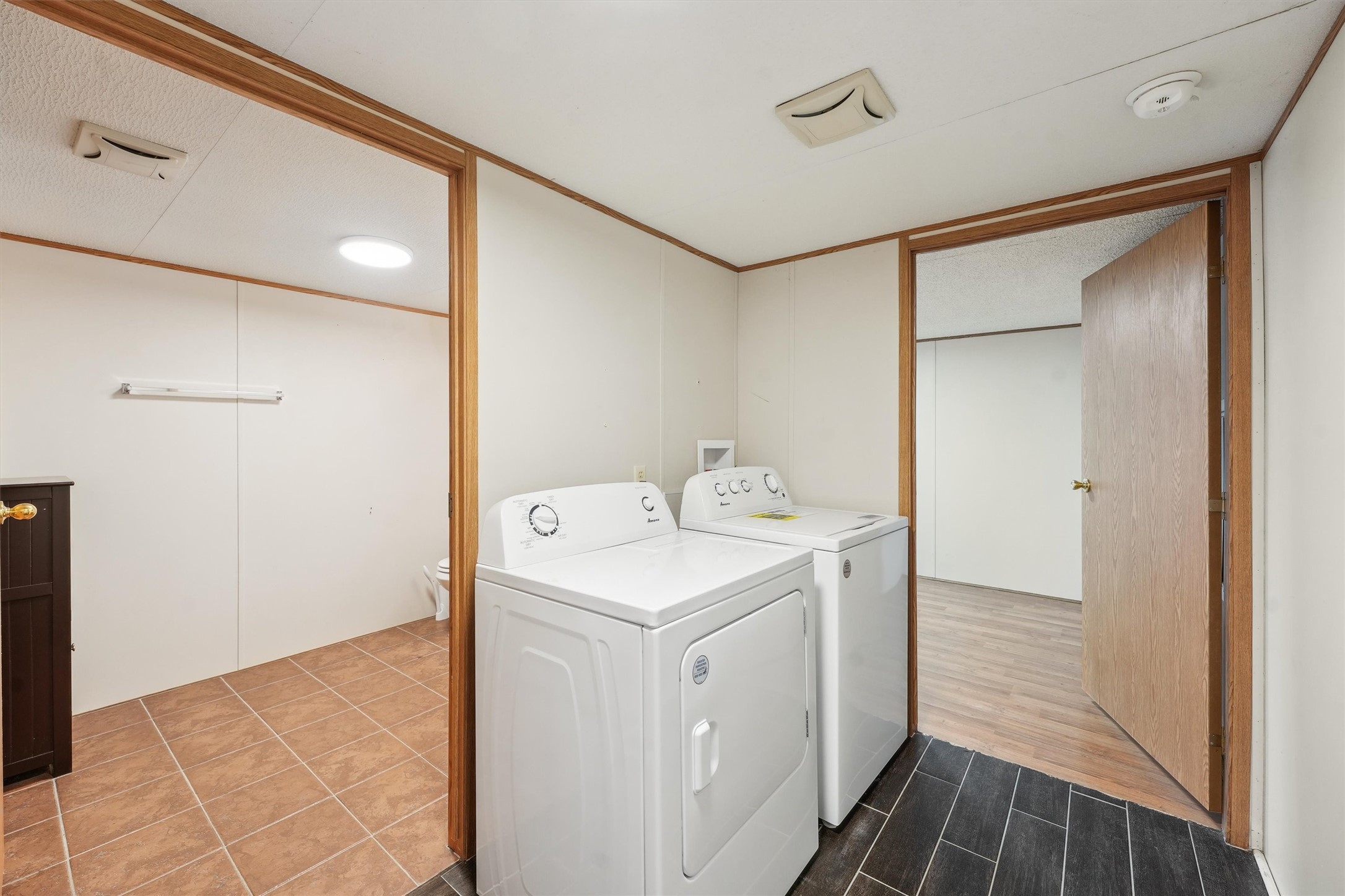 231 Monte Carlo Road Point Blank, TX 77364 - Photo 10 of 15 a utility room with dryer and washer