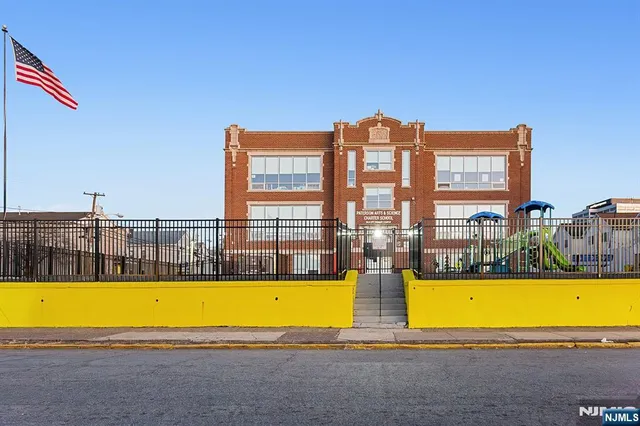 a view of swimming pool with outdoor seating and yard