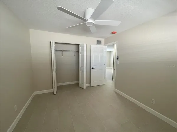 an aerial view of residential building and lake