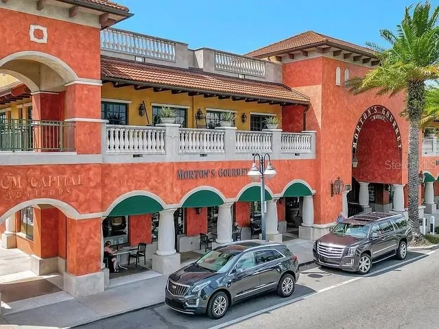 a view of a house with a garden and entryway