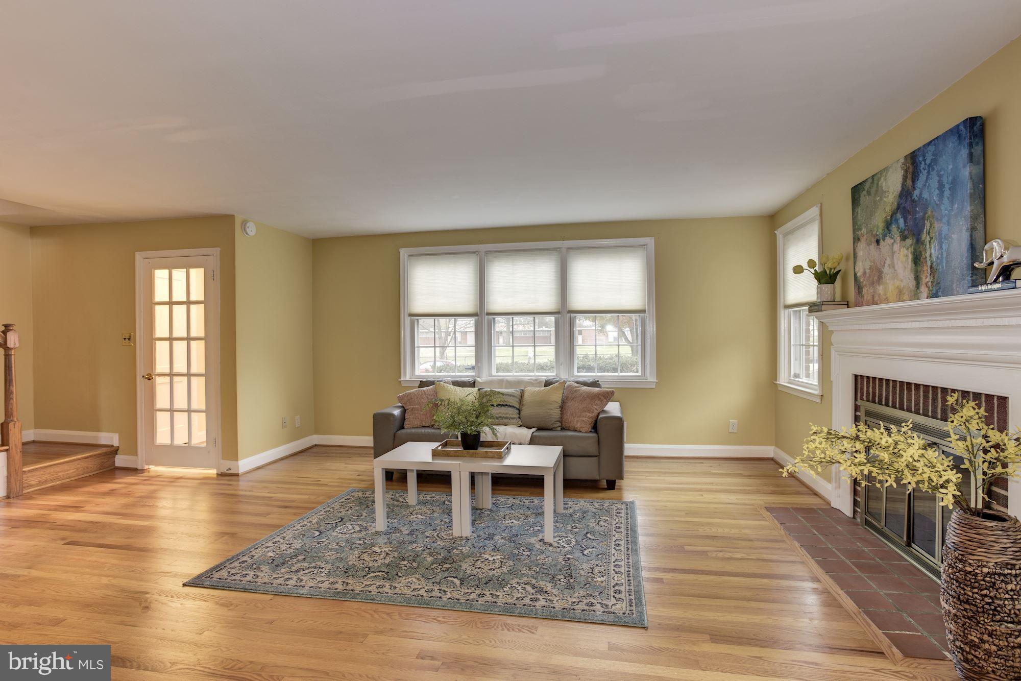 8119 Barksdale Road Baltimore, MD 21286 - Photo 6 of 29 Modern french door entry and wood burning FP