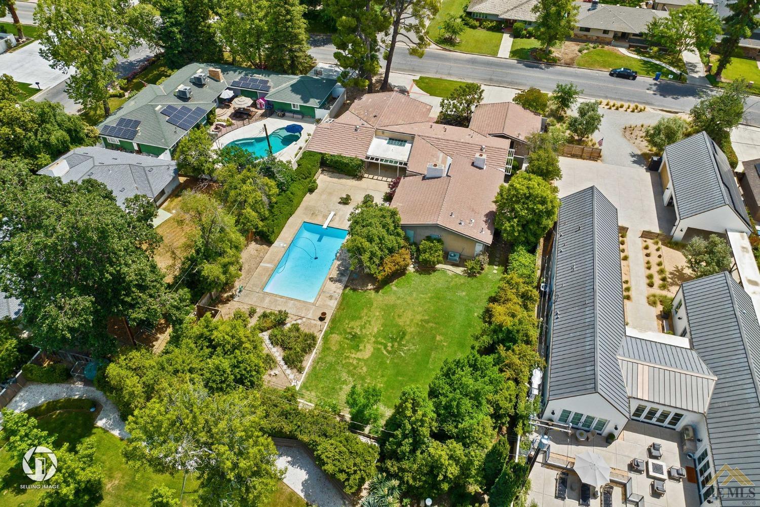 Undisclosed Address Bakersfield, CA 93309 - Photo 61 of 63 an aerial view of residential house with outdoor space and trees all around