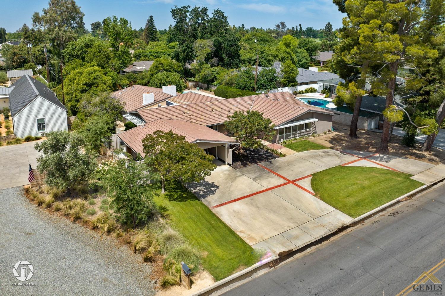 Undisclosed Address Bakersfield, CA 93309 - Photo 63 of 63 an aerial view of a residential houses with outdoor space and street view