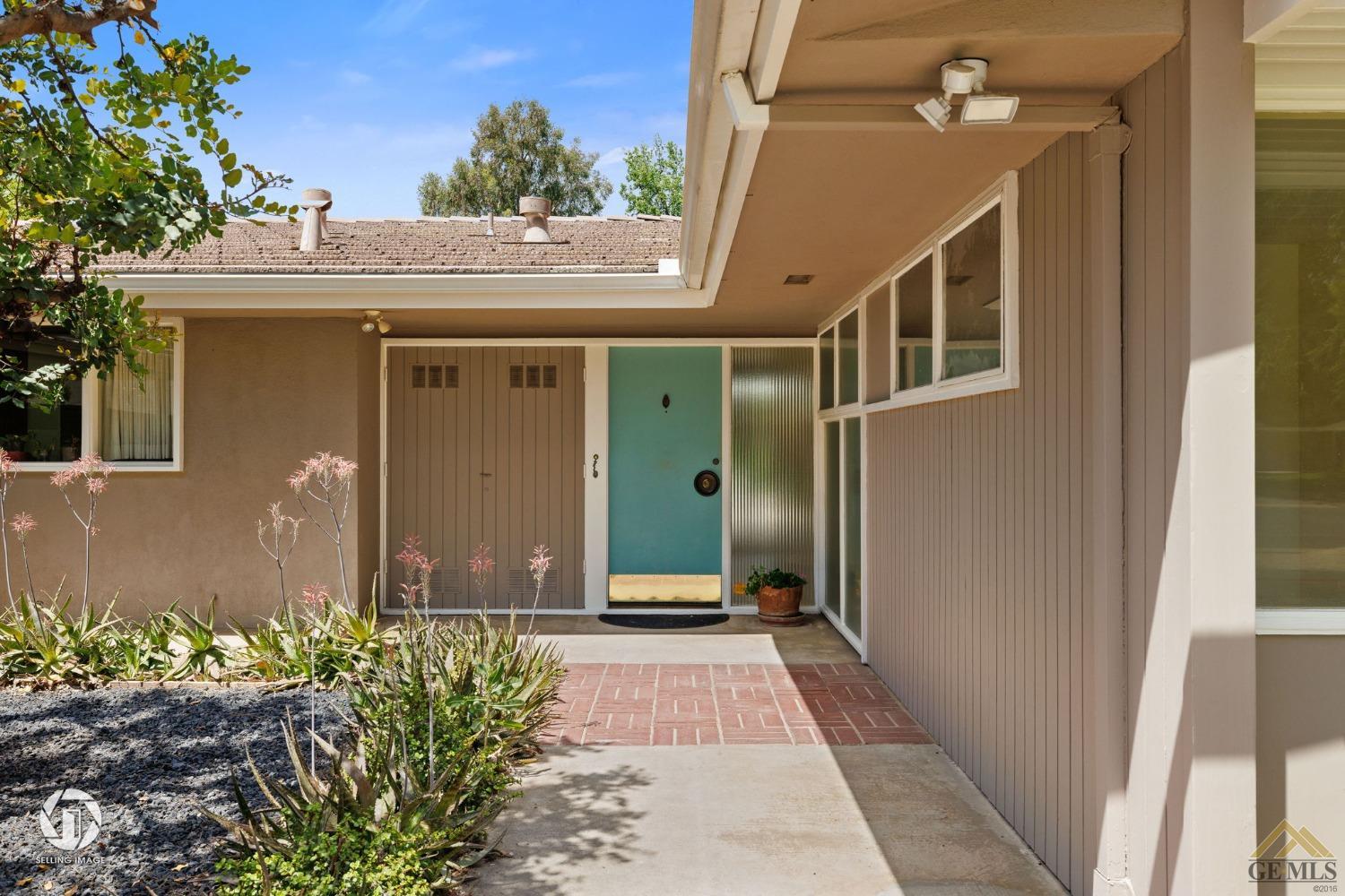 Undisclosed Address Bakersfield, CA 93309 - Photo 10 of 63 a view of a front door of the house
