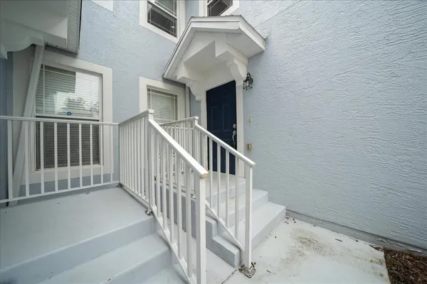 a kitchen with stainless steel appliances a refrigerator and a sink