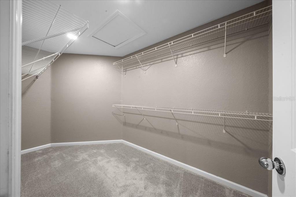 4555 Southwest 52nd Circle, Unit 106 Ocala, FL 34474 - Photo 25 of 100 a view of a room with racks on the wall