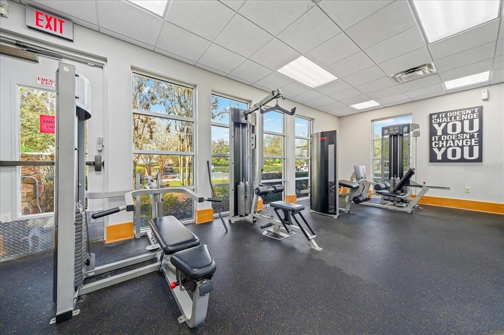 4555 Southwest 52nd Circle, Unit 106 Ocala, FL 34474 - Photo 50 of 100 a view of a room with gym equipment