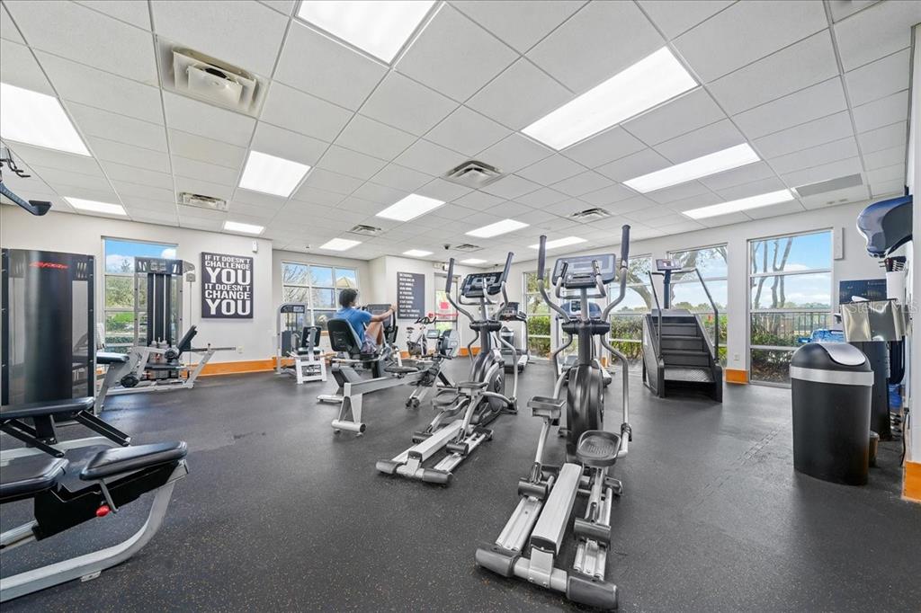 4555 Southwest 52nd Circle, Unit 106 Ocala, FL 34474 - Photo 51 of 100 a view of a room with gym equipment