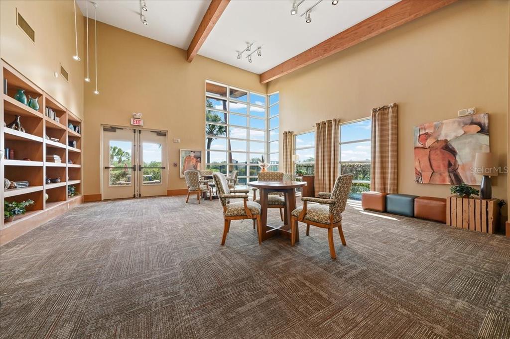 4555 Southwest 52nd Circle, Unit 106 Ocala, FL 34474 - Photo 56 of 100 a view of a livingroom with furniture and a window