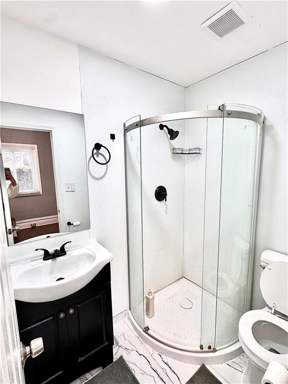 94 Lafferty Avenue Pittsburgh, PA 15210 - Photo 12 of 35 a bathroom with a sink toilet and shower