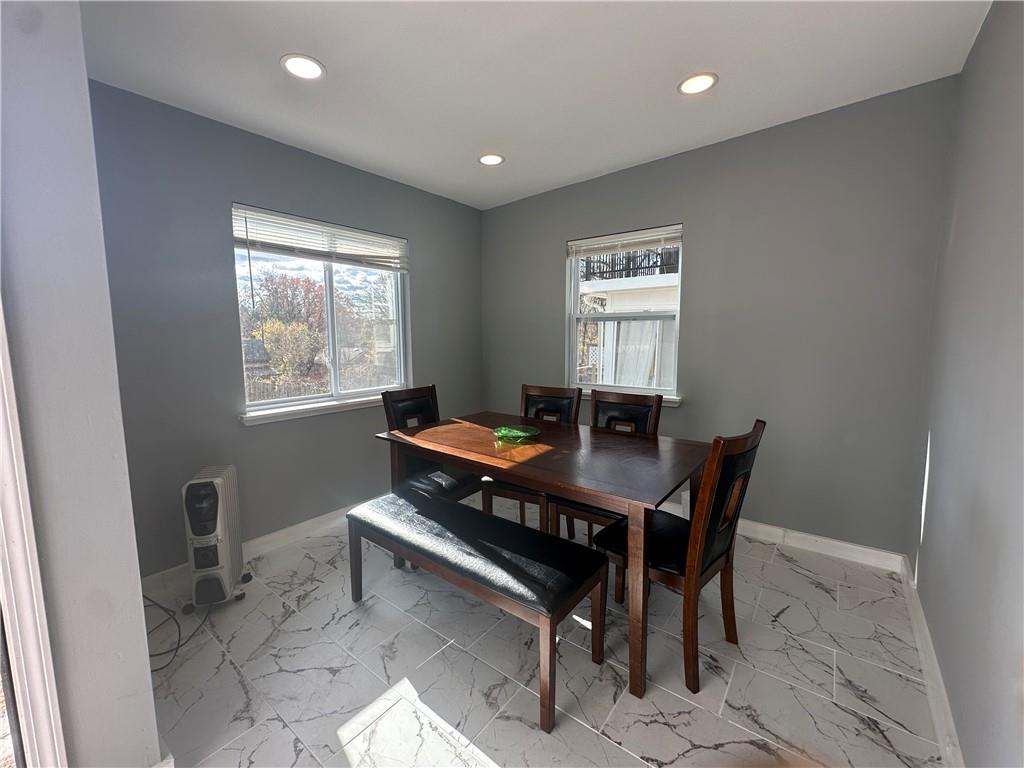 94 Lafferty Avenue Pittsburgh, PA 15210 - Photo 18 of 35 a dining room with a table and chairs