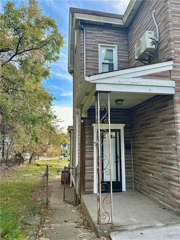 a view of a house with a patio