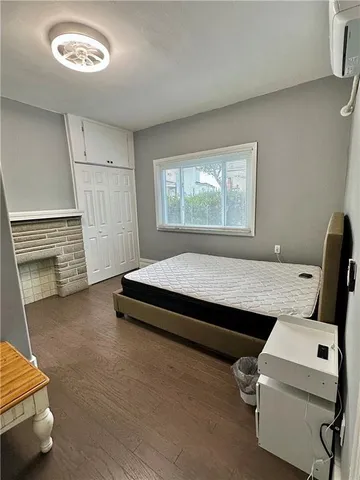 a kitchen with stainless steel appliances a stove microwave and sink