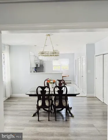 a view of a table and chairs in a room