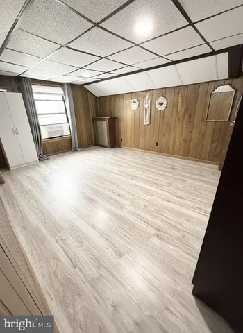a view of a livingroom with wooden floor