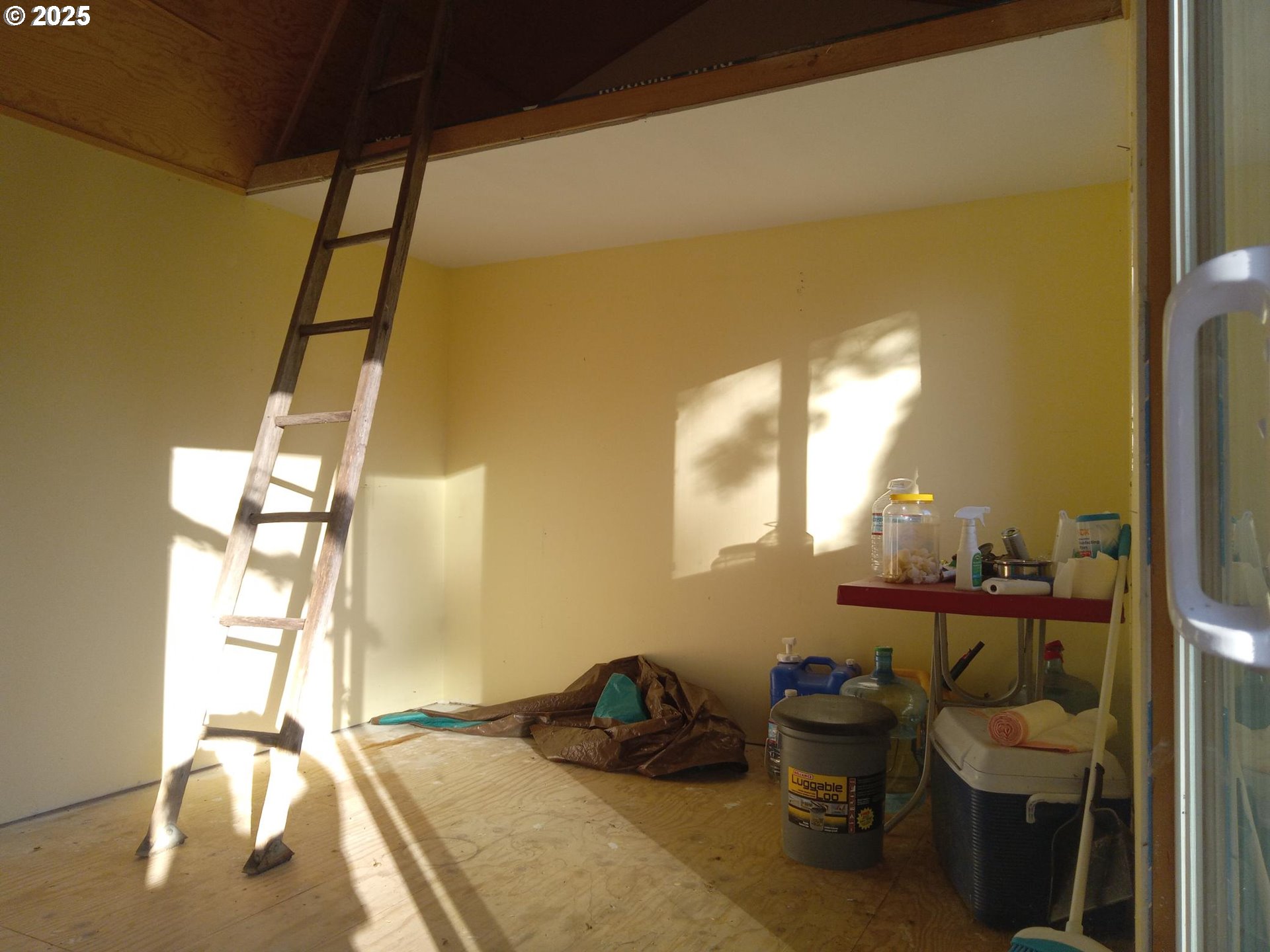Wilderness Loop, Unit 7576 Goldendale, WA 98620 - Photo 3 of 16 a room with a chair and gym equipment