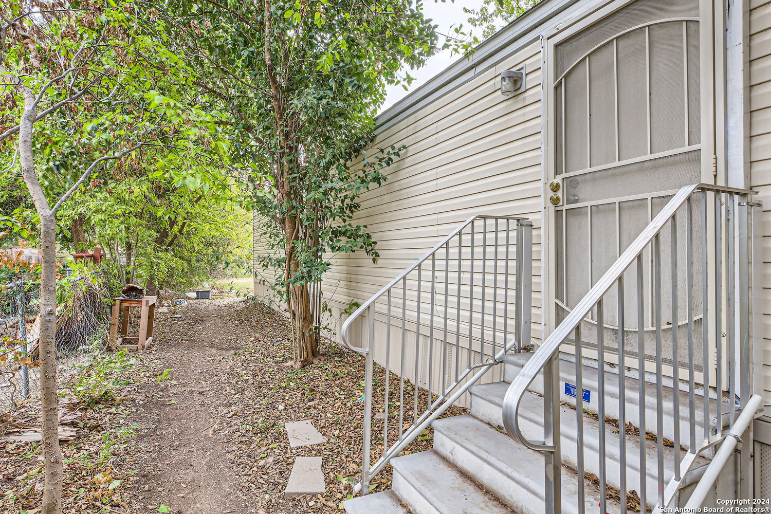 4423 East Houston Street San Antonio, TX 78219 - Photo 10 of 11 a view of entryway with wooden floor