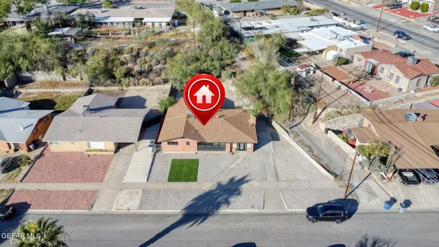 an aerial view of residential house with outdoor space